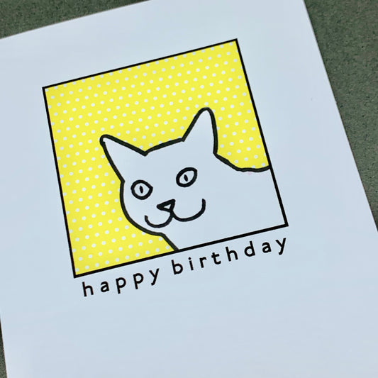 Cat on yellow polka dots