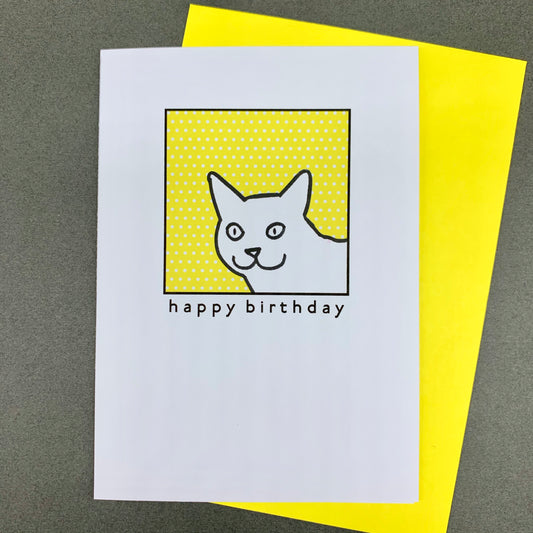 Cat on yellow polka dots